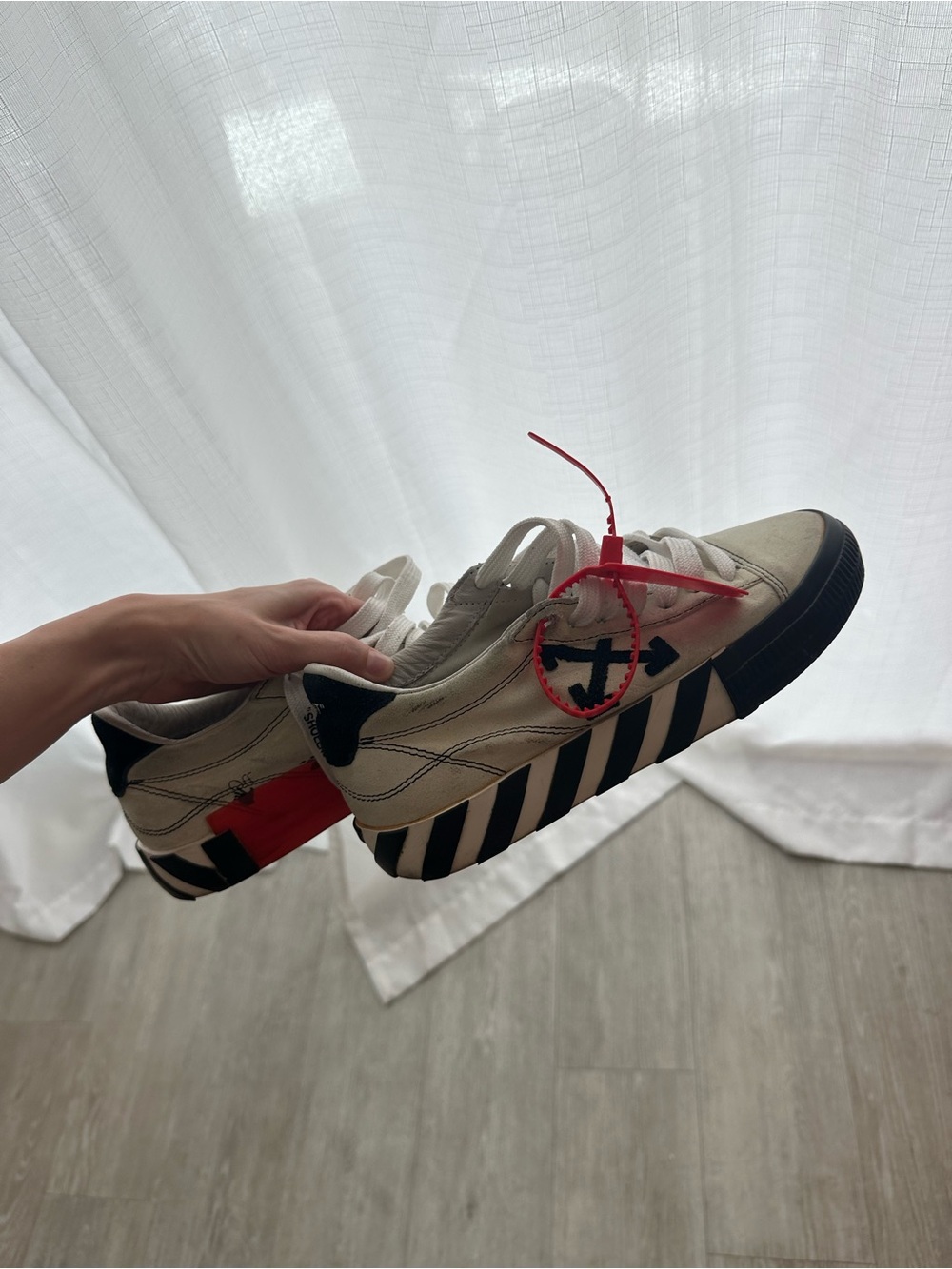 Off-White Low-Top Sneakers in White with Black Stripes & Red Accents